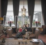 19-12-2003 Robert and Monique Schoemacher at home in Scheveningen.

[keywords]Posed: Full Length, Eyecontact, Livingroom, Plastic Surgeon[/keywords]